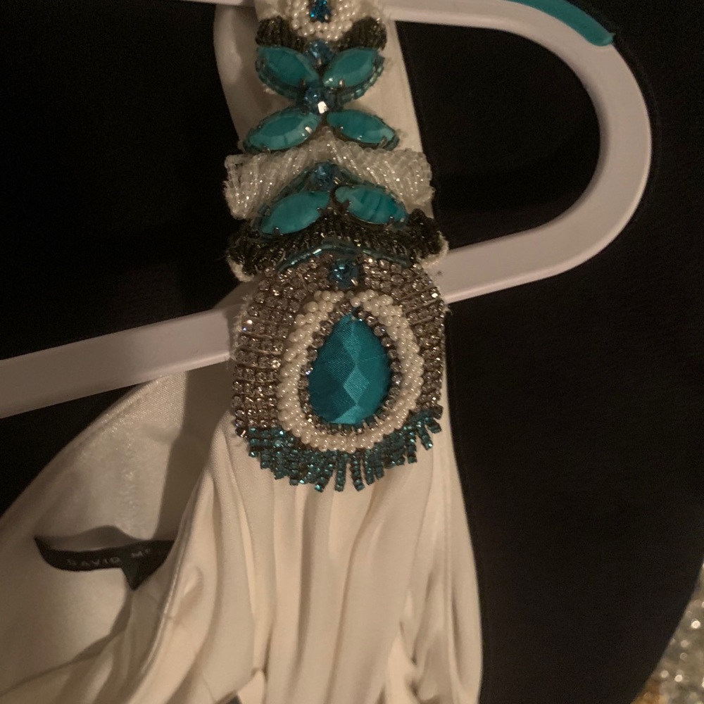 One Shoulder Gown with embellishments.